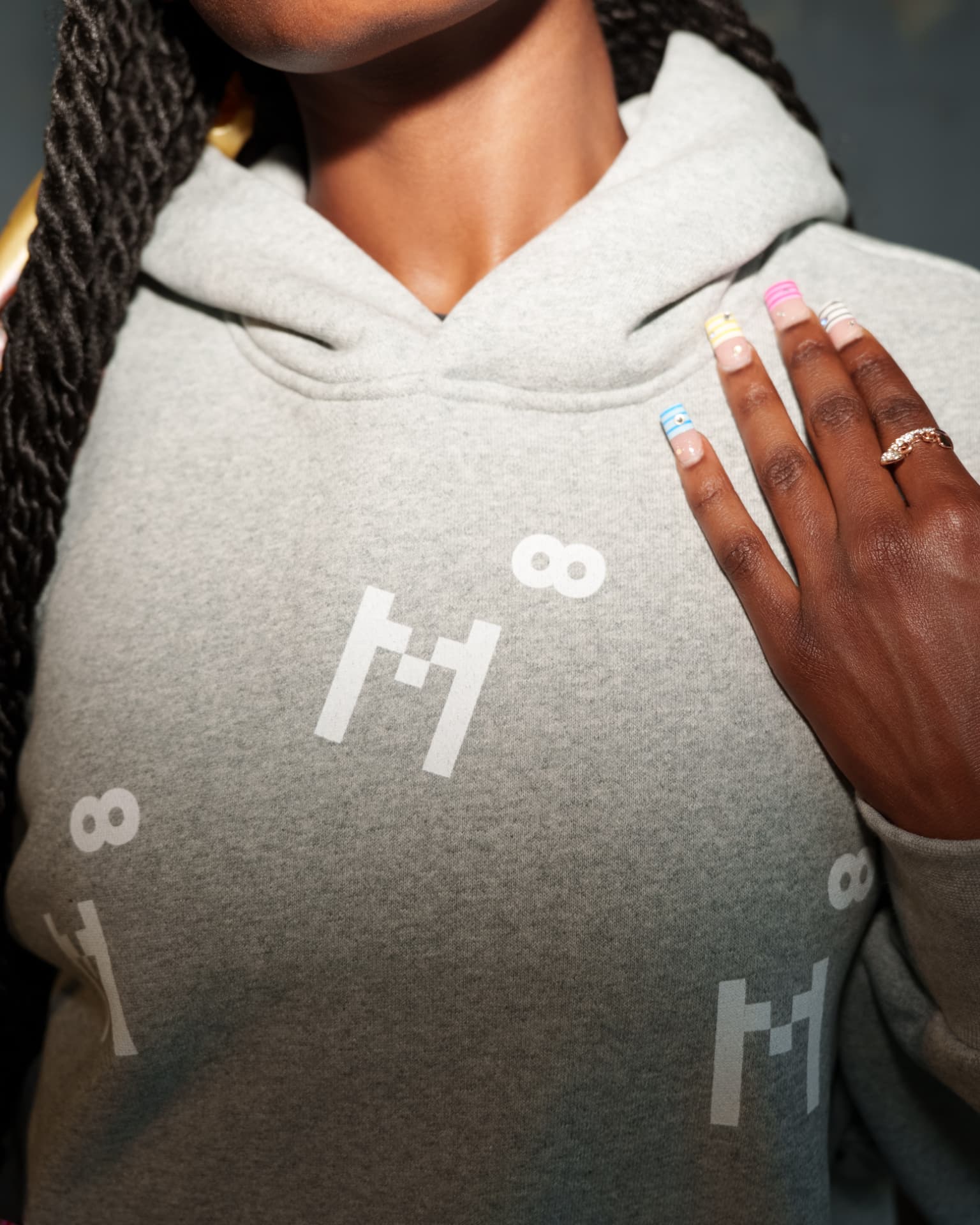 Multidimensional heather gray hoodie close-up